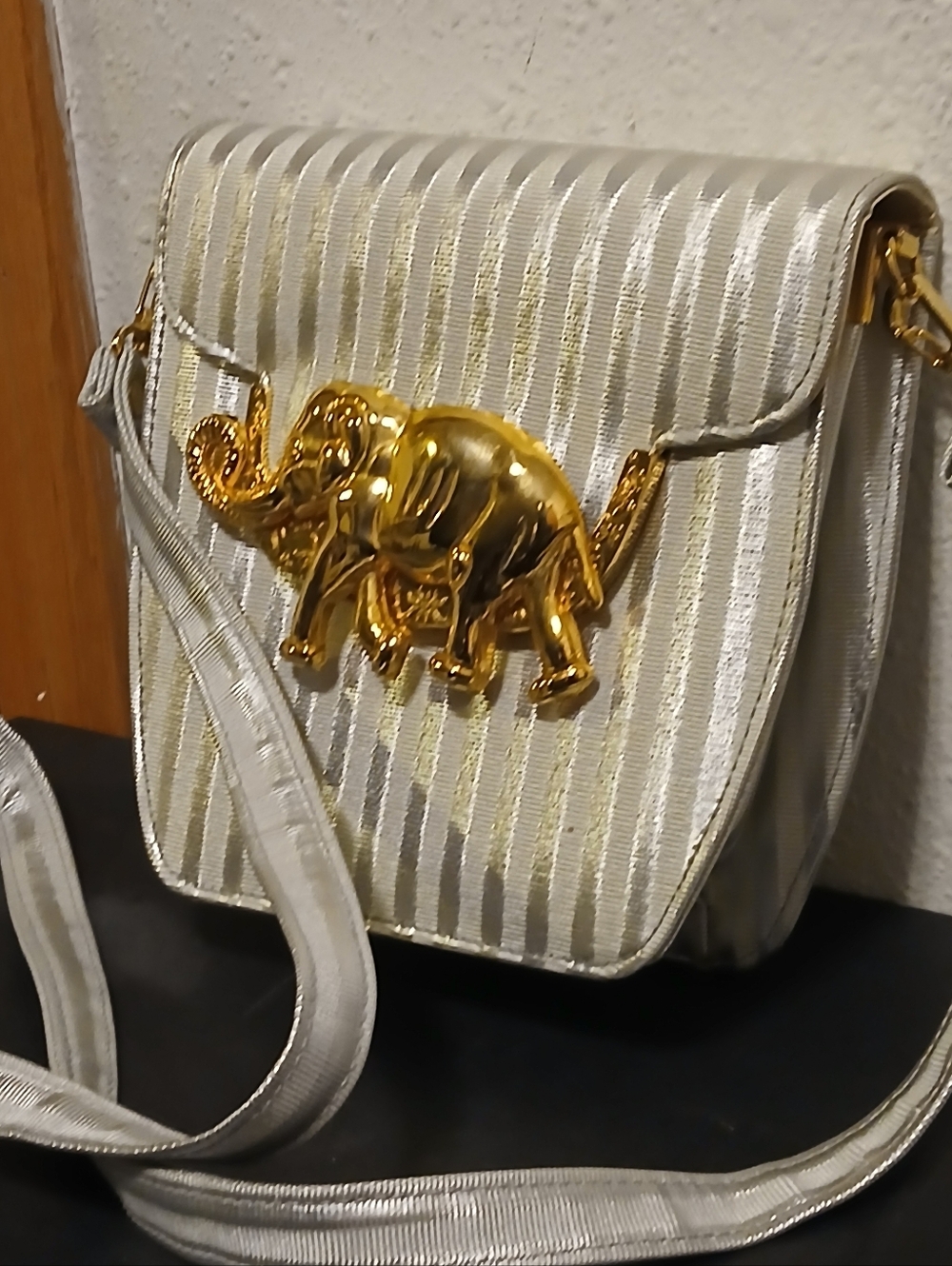 Vintage Metallic Silver & White Striped Crossbody Bag with Gold Elephant Emblem